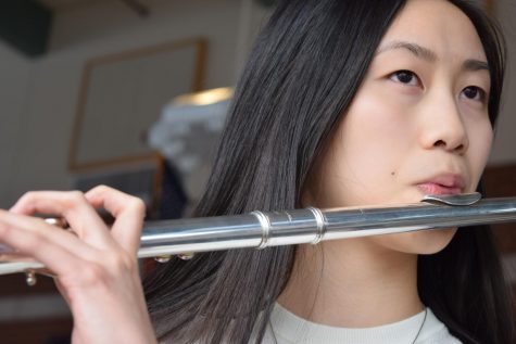 Photo: Rachel Chen playing flute