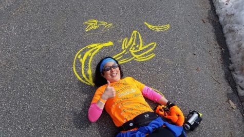 Photo: Denise Antaki posing with the banana she wants at the finish line.