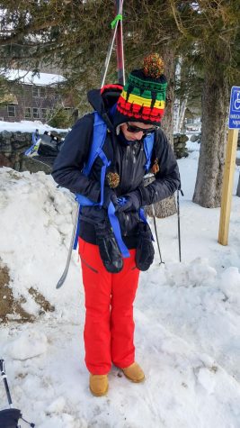 Photo: Chris Pomeroy getting situated, strapping his brand new pack to his back in the parking lot of the Pinkham Notch Visitor Center.