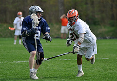 Junior Jonathan Lee defends against Medway on Tuesday as the Hiller boys won 14-8. Photo By Ryan McLean