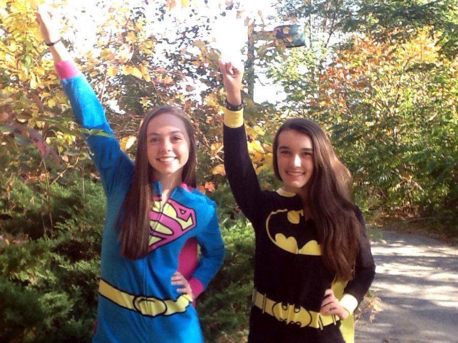 Photo: Freshmen Colette Fritsche (Superman) and Sarah Durr (Batman) kick off Spirit Week, posing as the Worlds Finest duo on Pajama Day 2013.