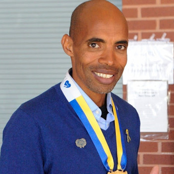 In April of 2014, Runner Meb Keflezighi became the first American to win the Boston Marathon since 1983, an especially significant win just a year after the bombings. Photo by Jillian Sullivan.