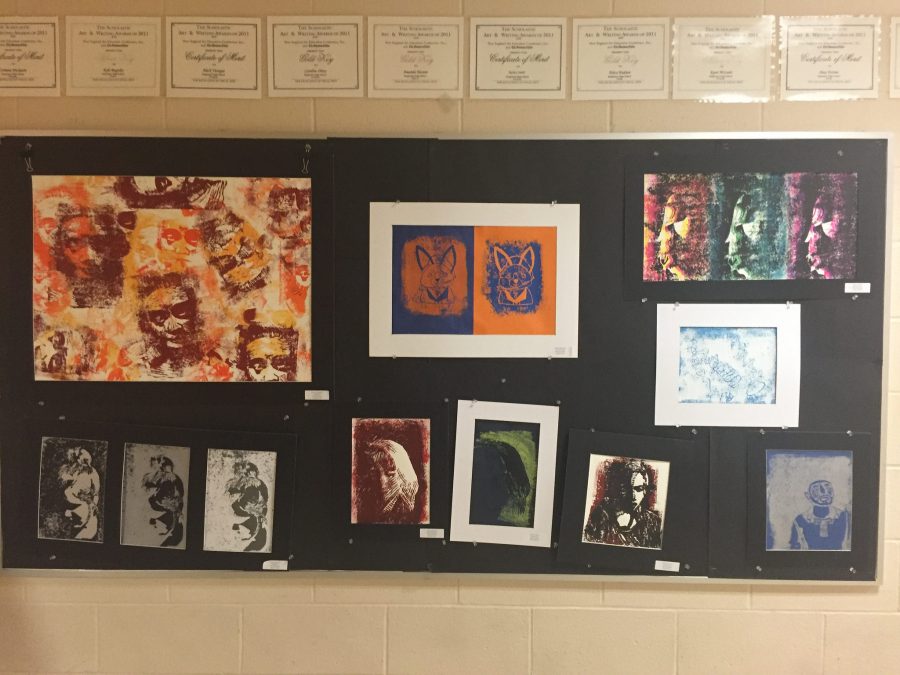 More artwork made by Hopkinton students decorates the walls of the art hallway. Photo by Allison McNulty.