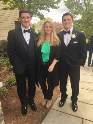 Photo-Claire Delaney poses with her twin sons on prom day
