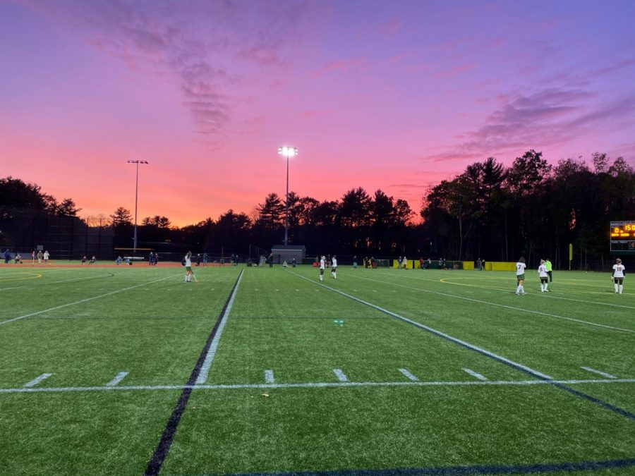 Hopkinton gets in formation at the games 4:45 start. Hopkintons offensive pressure at the beginning of the game allowed them to take control of the field. After the original game was postponed due to snow, the team was excited to play under the lights.