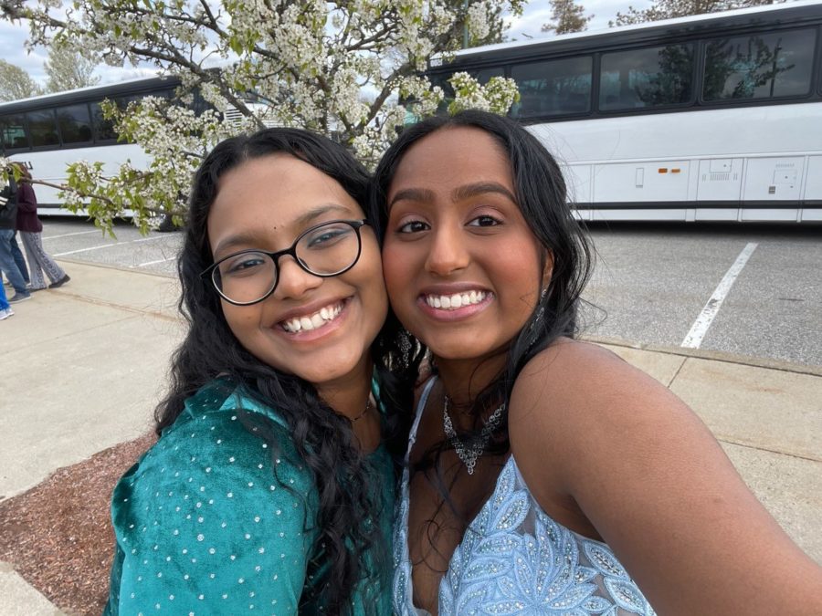 Nithi Vankineni (in the blue) taking a slefie with her friend while waiting for their bus to take them to prom.