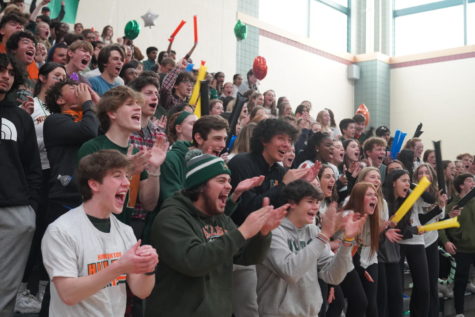 The junior class yells during the noise competition. I had a blast at pep-rally. It was great to finally experience it indoors. said Sam Pantera, pictured with his peers. 