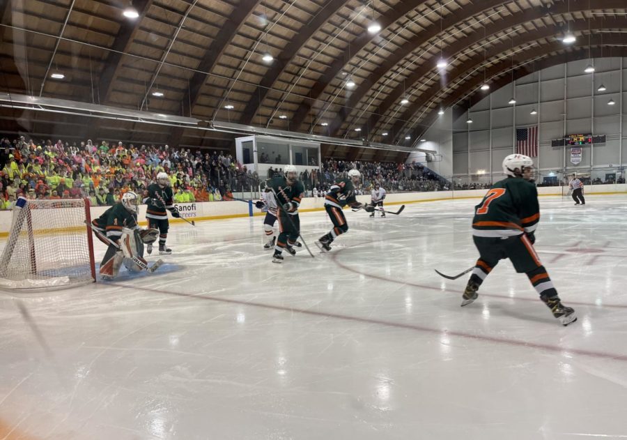 Goalie Jack Lang protecting the Hillers goal from Walpole. The Hillers were getting ready to skate back to Walpole territory to score a goal. I think its a great team. Everyone wants to win, Mansur said. 