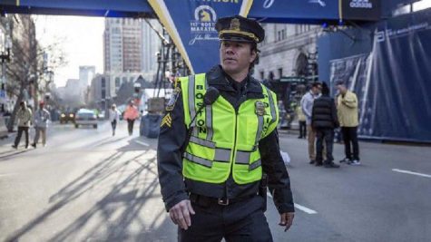 Mark Wahlberg as Tommy Saunders at the finish line of the Boston Marathon in the film Patriots Day