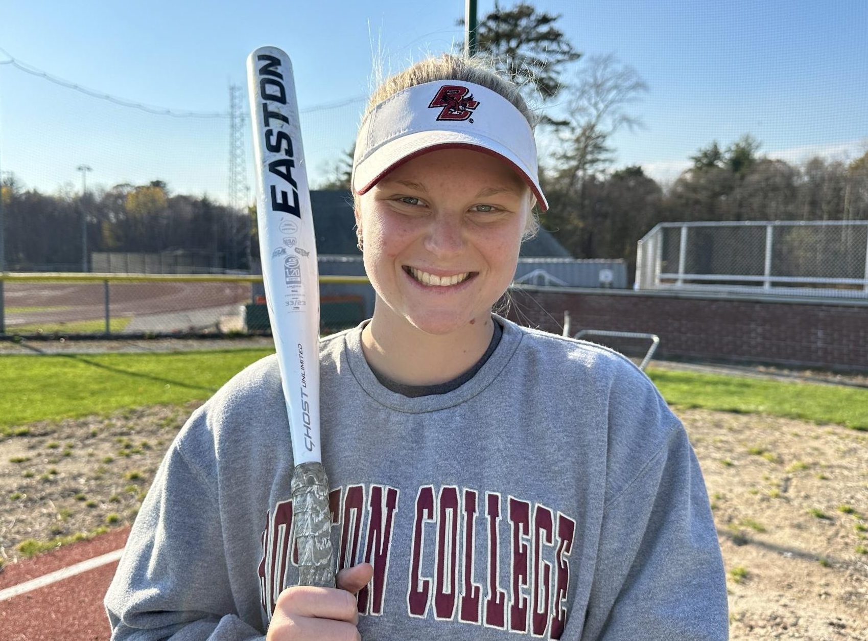 Holly Paharik wears her Boston College softball visor to show that she has verbally committed to the university.
