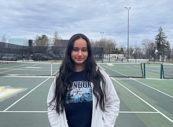 Aryaa Dixit on the tennis court where she plays for the varsity tennis team.