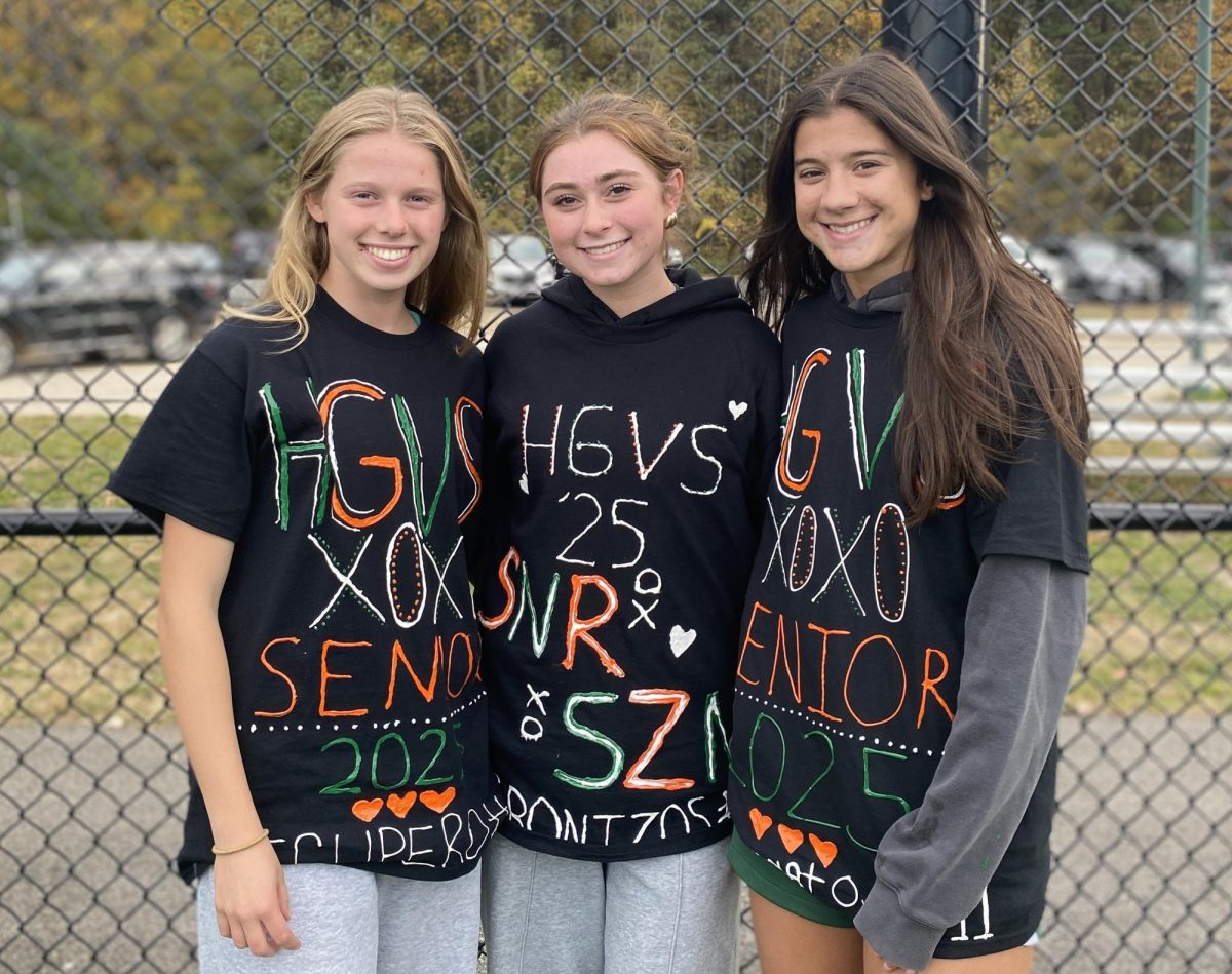 The three captains (from left to right), Maddie Recupero, Fotini Grontzos and Nina Tzouganatos smile for a picture on their home turf. This was moments before defeating Dedham on their senior night. “I think what has made us so successful this year has been our team chemistry both on and off of the field,” Tzouganatos said.