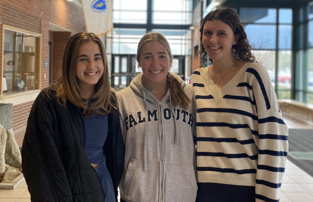 (From left to right) Emily Watson, Zoe Adams, and Lainey Valutkevich smile for a picture the morning after their end of season banquet. Each senior gave a closing speech and said a final goodbye to Hopkinton field hockey. 